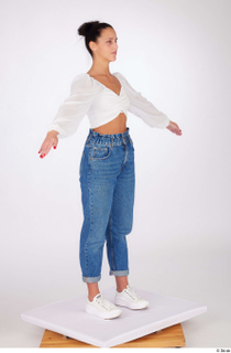 Suleika a-pose dressed high waist loose jeans standing white balloon…